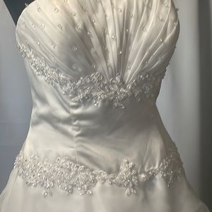 - Ivory ruffled Gown